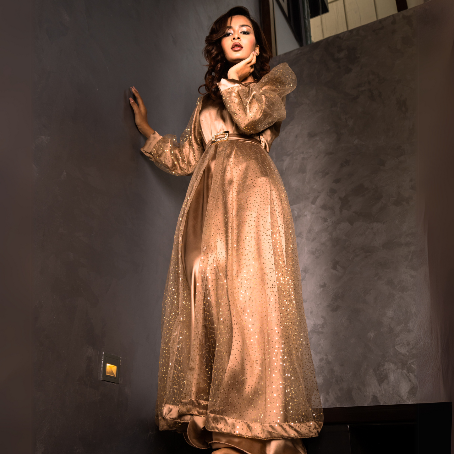 Golden Sands gown – elegant satin silk bodice with princess seams, golden sequin net puff sleeves, and a flowing double-layered flare