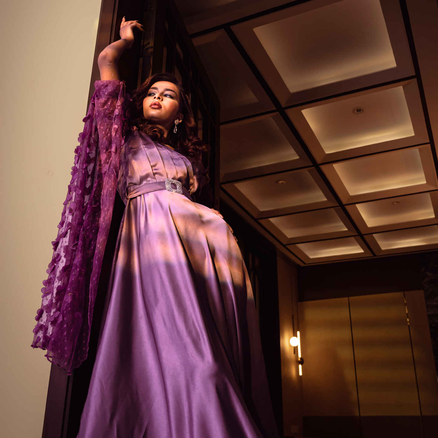 Full-length net sleeves with delicate 3D butterfly embroidery on lilac satin silk maxi gown.