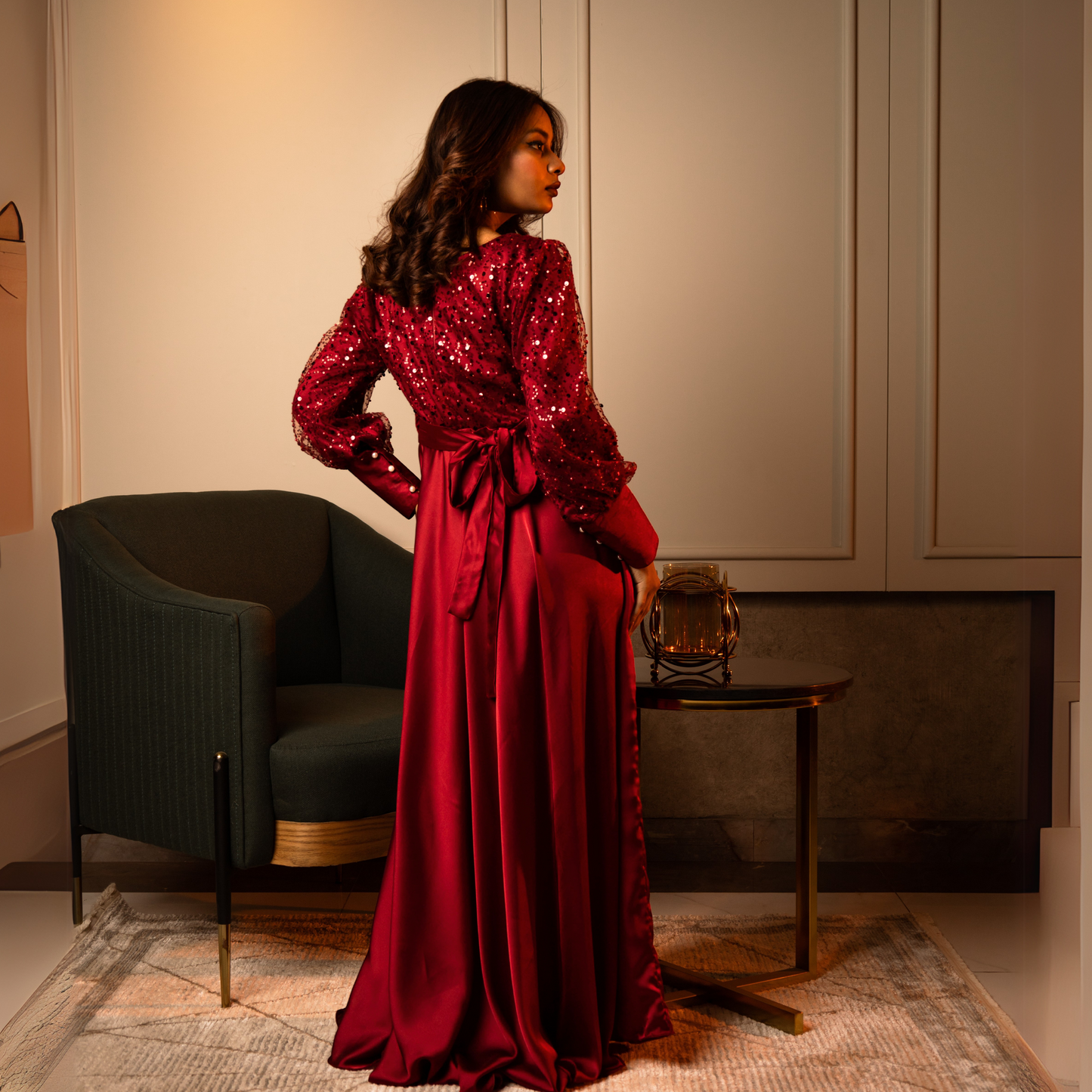 Scarlet gown with a zip-up back and tie-up belt, designed for an elegant evening look.