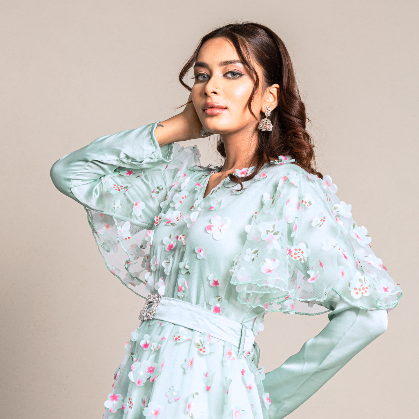 Bridgerton-inspired aqua gown with a lace-up corset back and flowing hemline.